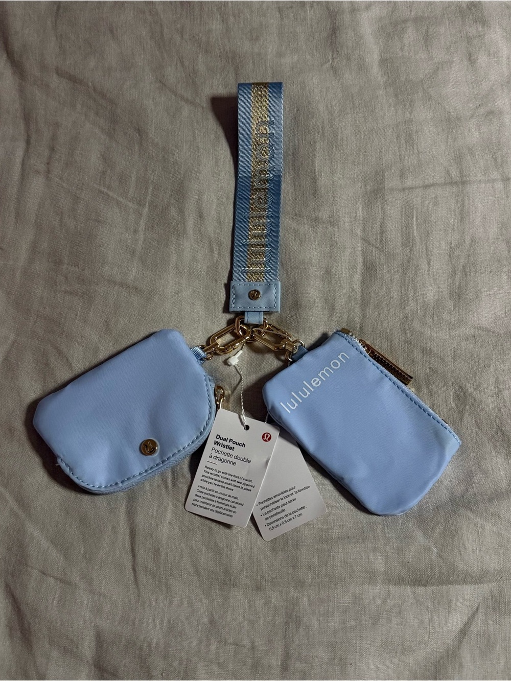 lululemon dual pouch wristlet blue and gold